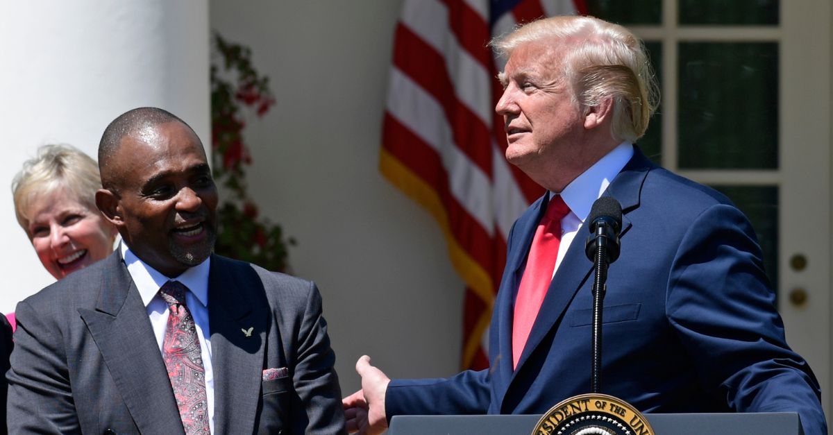 Left to right: Jon Ponder and Donald Trump at the White House.